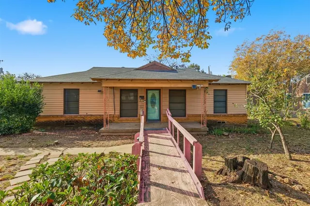 a living room with furniture and windows