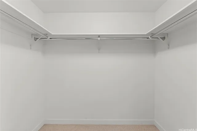 a view of a room with shelf on the wall