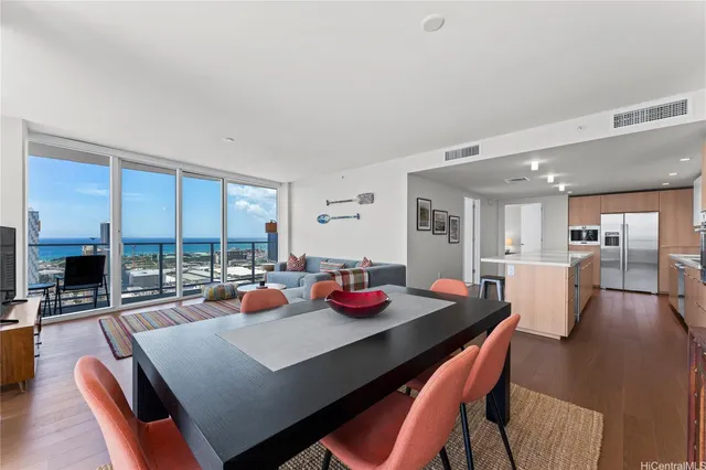a view of a dining room with furniture window and outside view