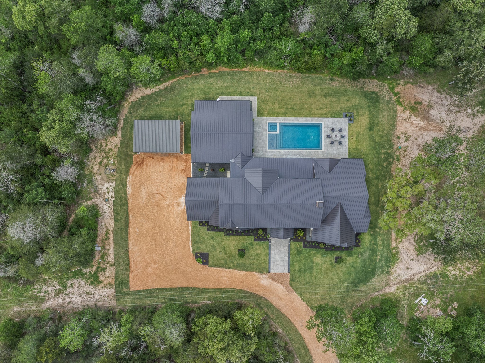 770 South Weyand Road Round Top, TX 78954 - Photo 48 of 50 an aerial view of a house