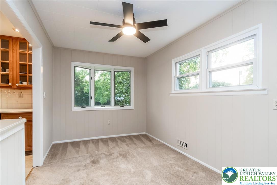 898 Walnut Road Warminster, PA 18974 - Photo 11 of 47 an empty room with a window and a ceiling fan