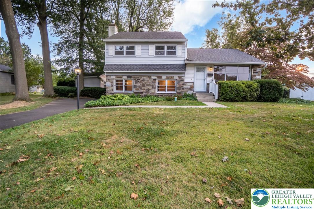 898 Walnut Road Warminster, PA 18974 - Photo 3 of 47 a front view of a house with a garden