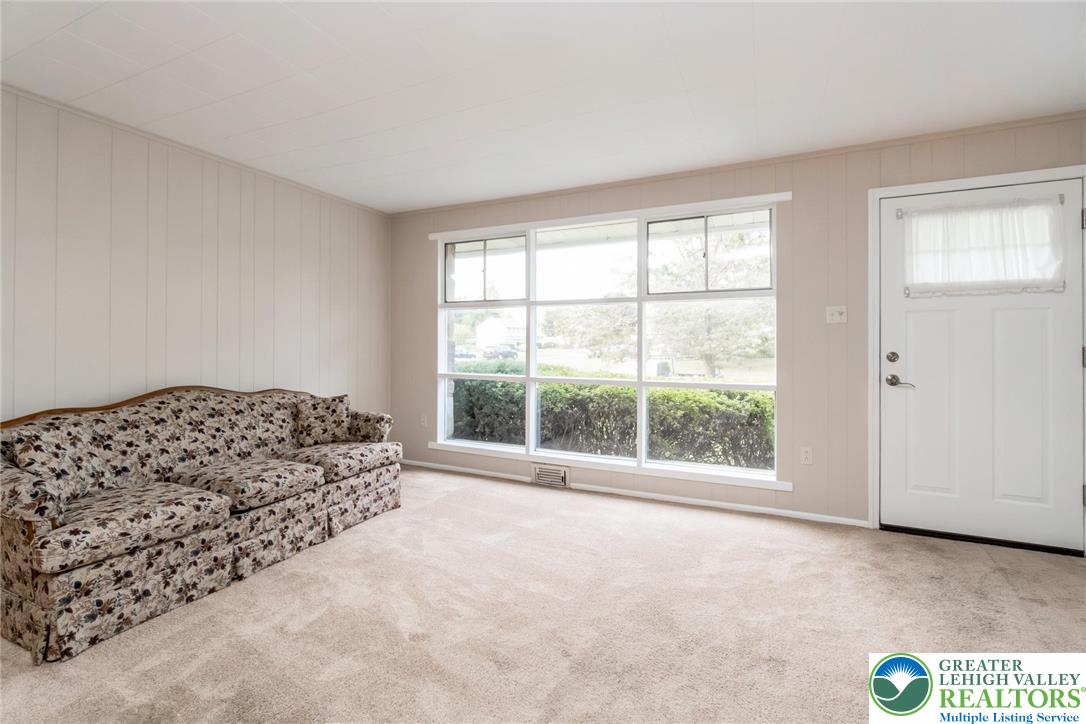 898 Walnut Road Warminster, PA 18974 - Photo 10 of 47 a large bed sitting in a bedroom next to a window