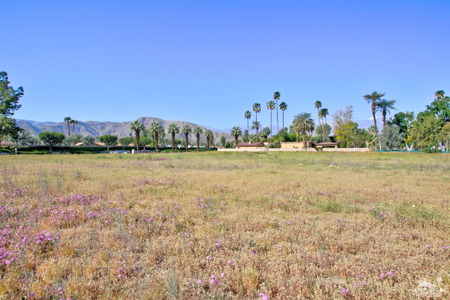 0 Thompson Road Rancho Mirage, CA 92270 - Photo 2 of 18 a view of a lake with houses in the back