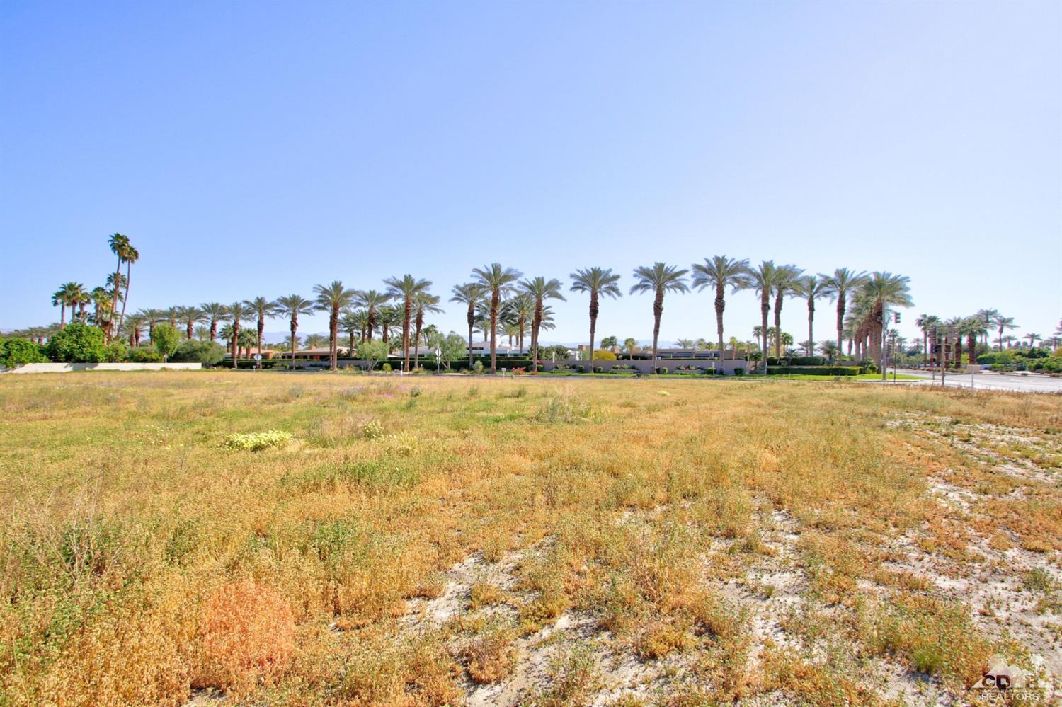 0 Thompson Road Rancho Mirage, CA 92270 - Photo 14 of 18 a view of a ocean with boats and trees in the background