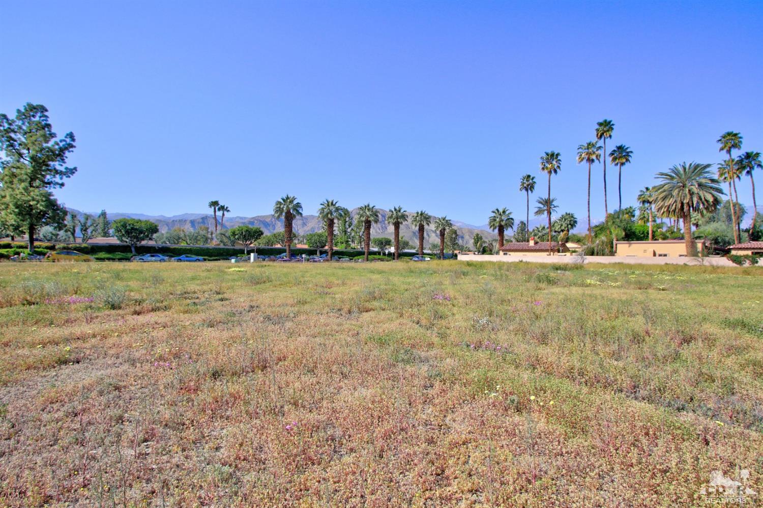 0 Thompson Road Rancho Mirage, CA 92270 - Photo 18 of 18 a view of a lake with houses in the back