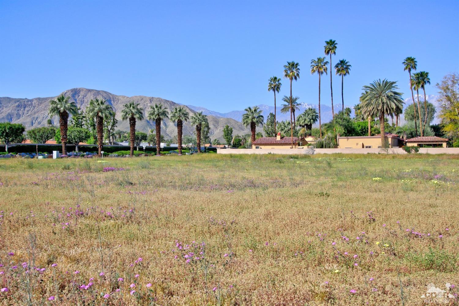 0 Thompson Road Rancho Mirage, CA 92270 - Photo 3 of 18 a view of a fountain in front of a house