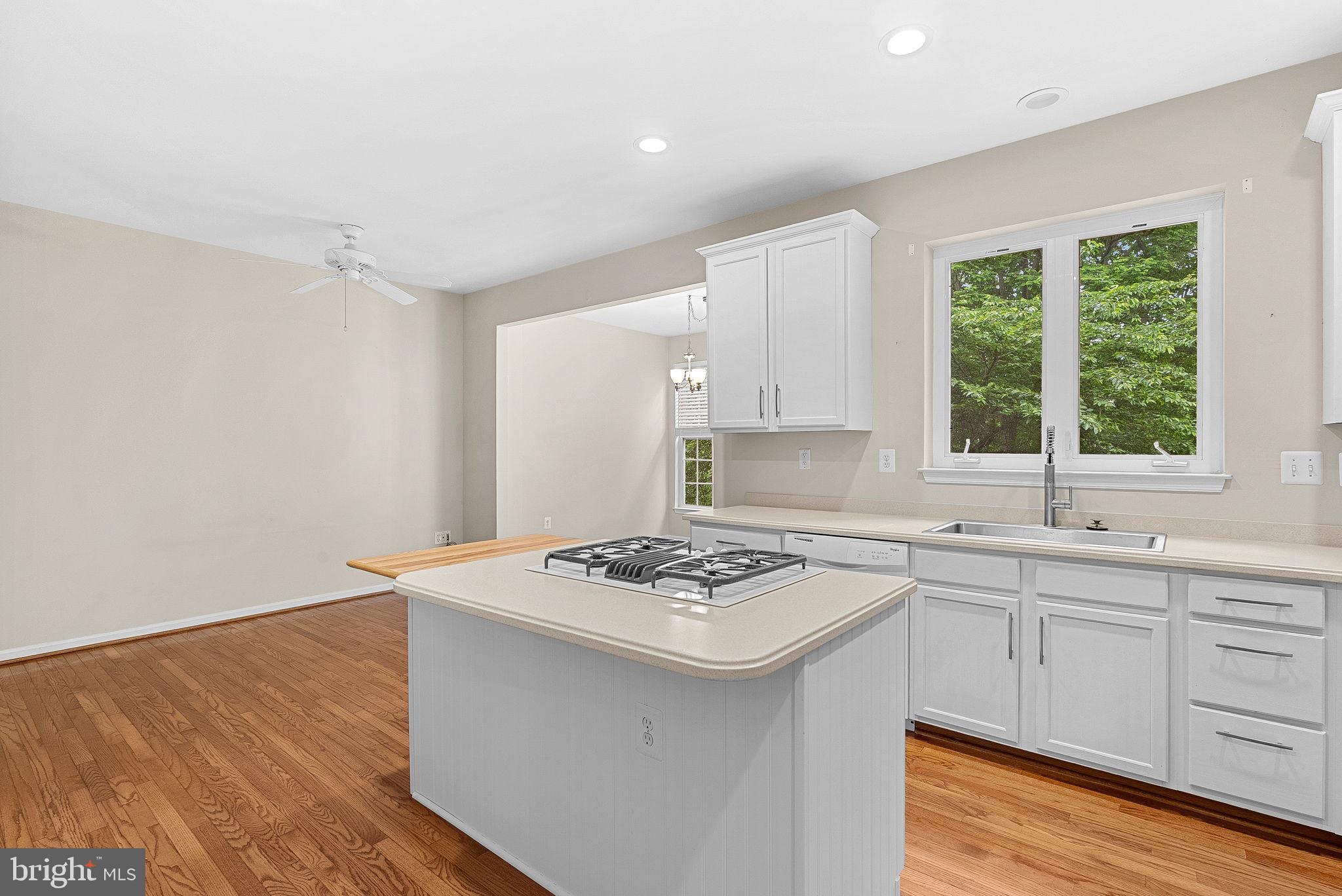 13574 Big Boulder Road Herndon, VA 20171 - Photo 14 of 45 a white kitchen with sink and cabinets