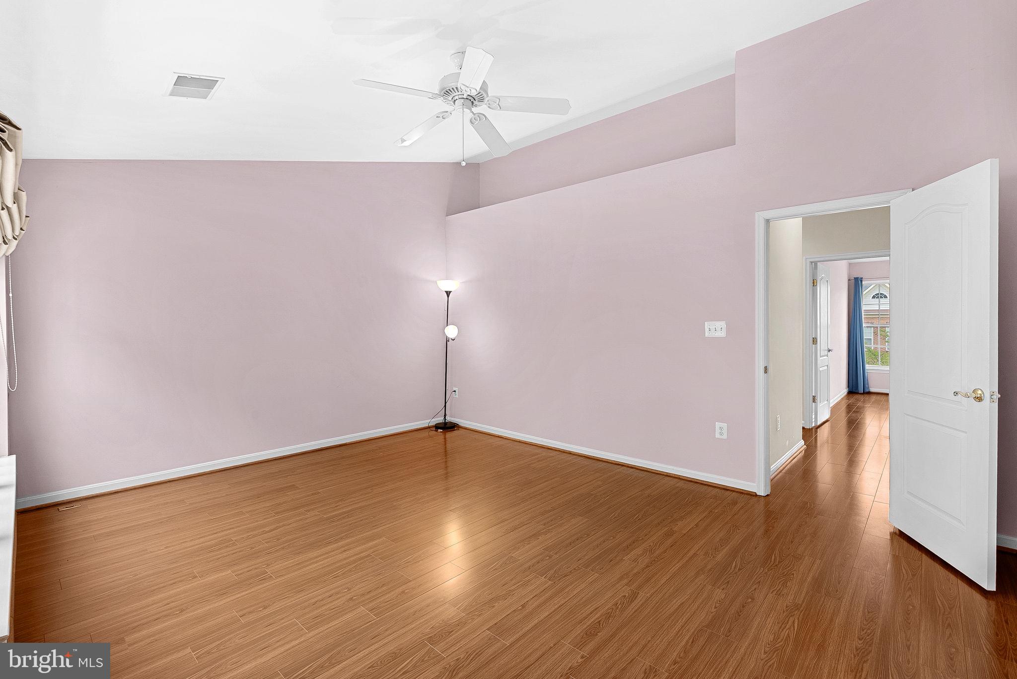 13574 Big Boulder Road Herndon, VA 20171 - Photo 27 of 45 a view of an empty room with wooden floor