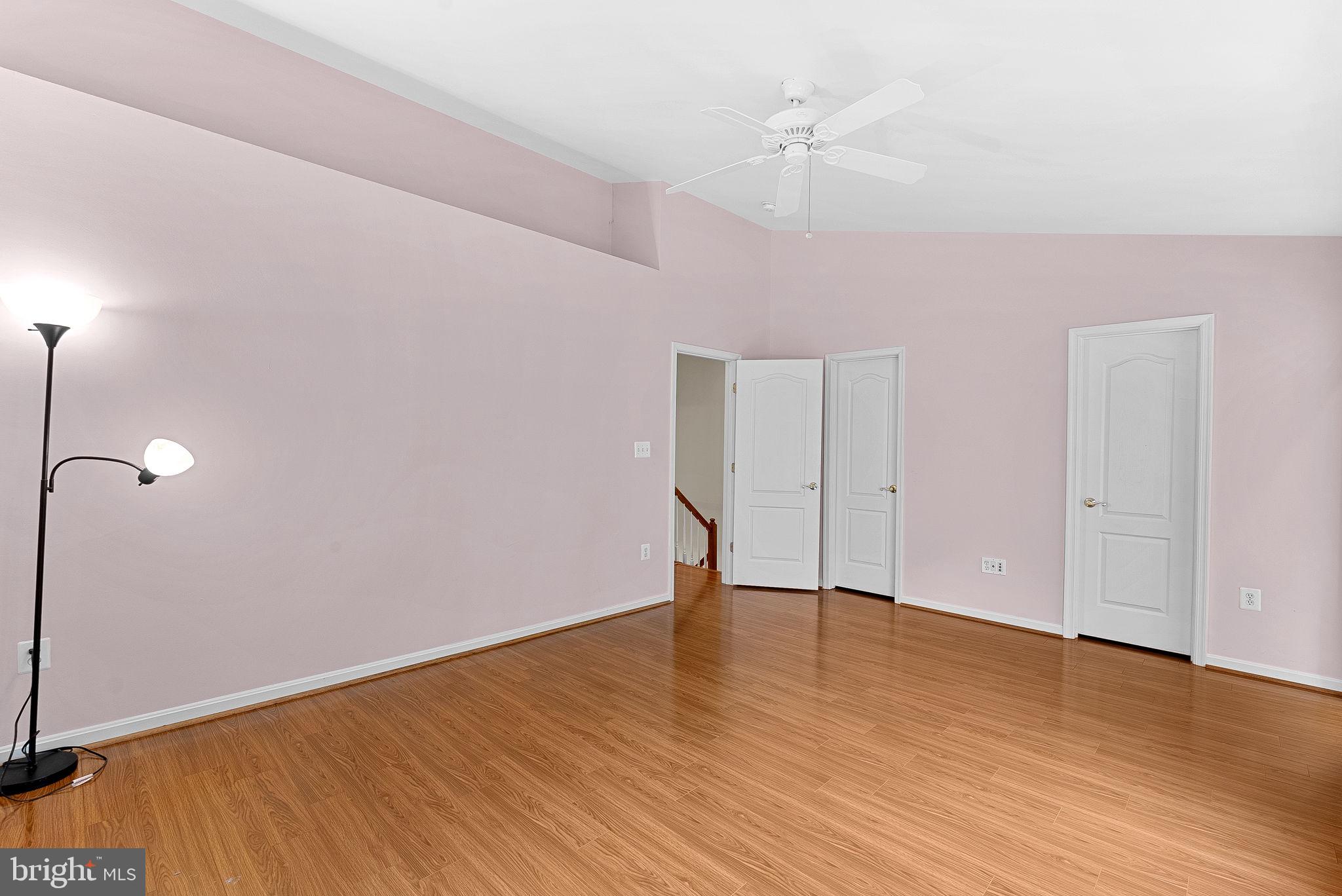13574 Big Boulder Road Herndon, VA 20171 - Photo 30 of 45 a view of an empty room with wooden floor