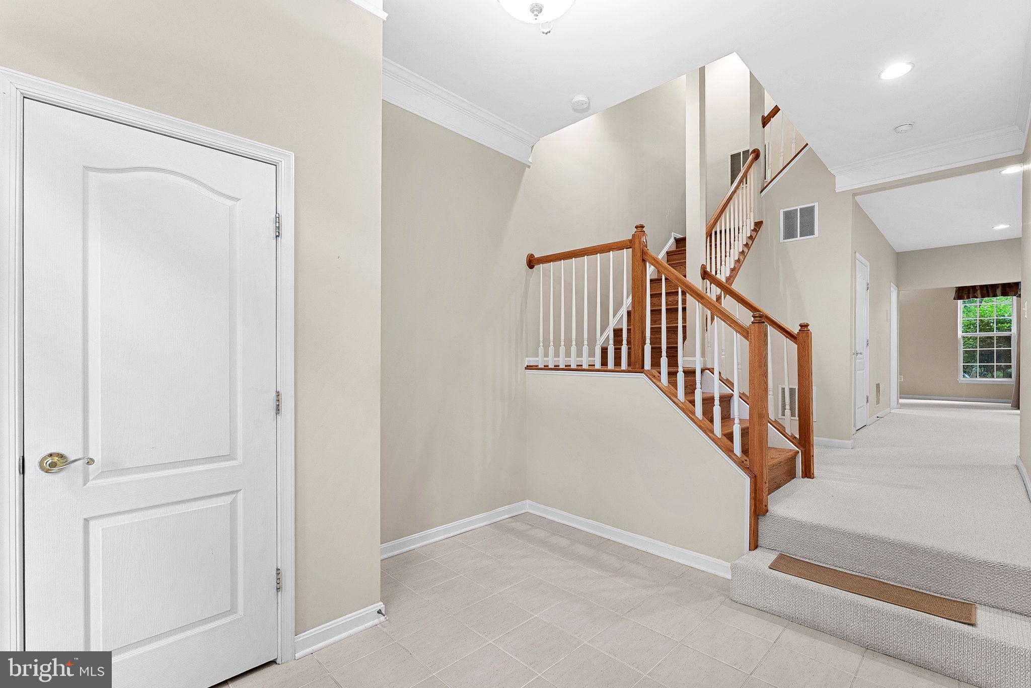 13574 Big Boulder Road Herndon, VA 20171 - Photo 3 of 45 a view of staircase with white walls and white walls
