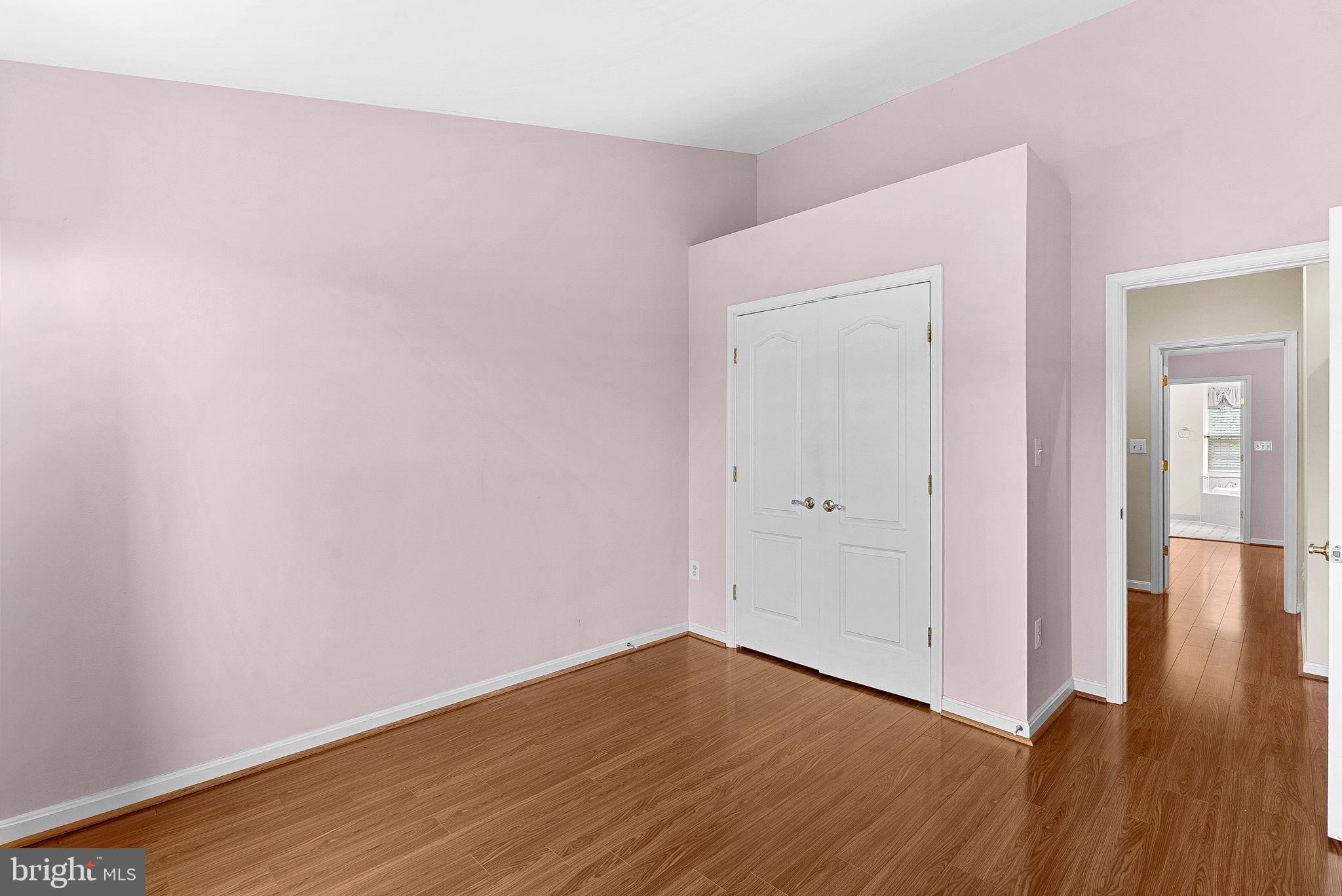 13574 Big Boulder Road Herndon, VA 20171 - Photo 38 of 45 a view of an empty room with wooden floor