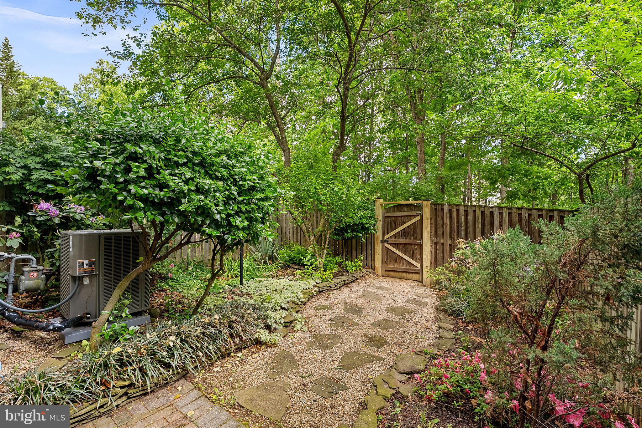 13574 Big Boulder Road Herndon, VA 20171 - Photo 45 of 45 a backyard of a house with lots of green space