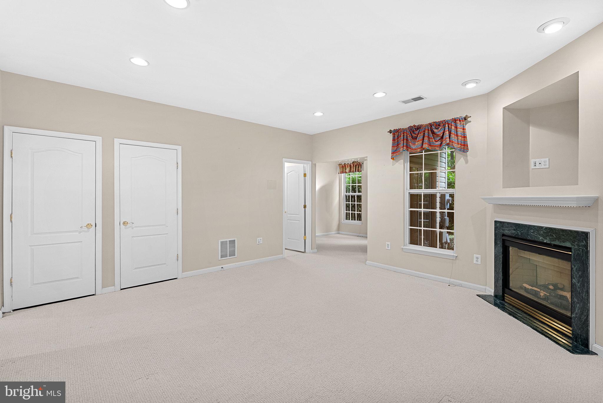 13574 Big Boulder Road Herndon, VA 20171 - Photo 5 of 45 a view of empty room with a fireplace