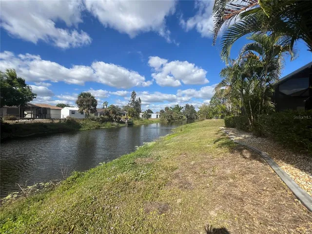 a view of a lake with houses