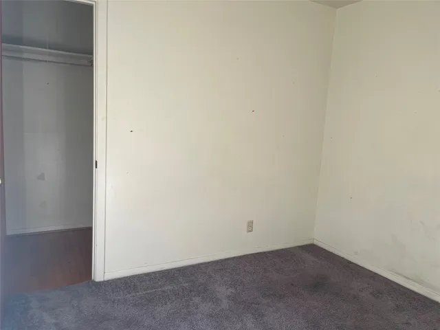 a view of a back yard from a hallway