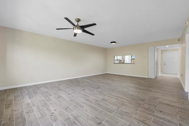 a bathroom with a toilet a sink and shower