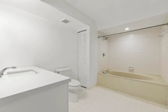 an aerial view of lake and city