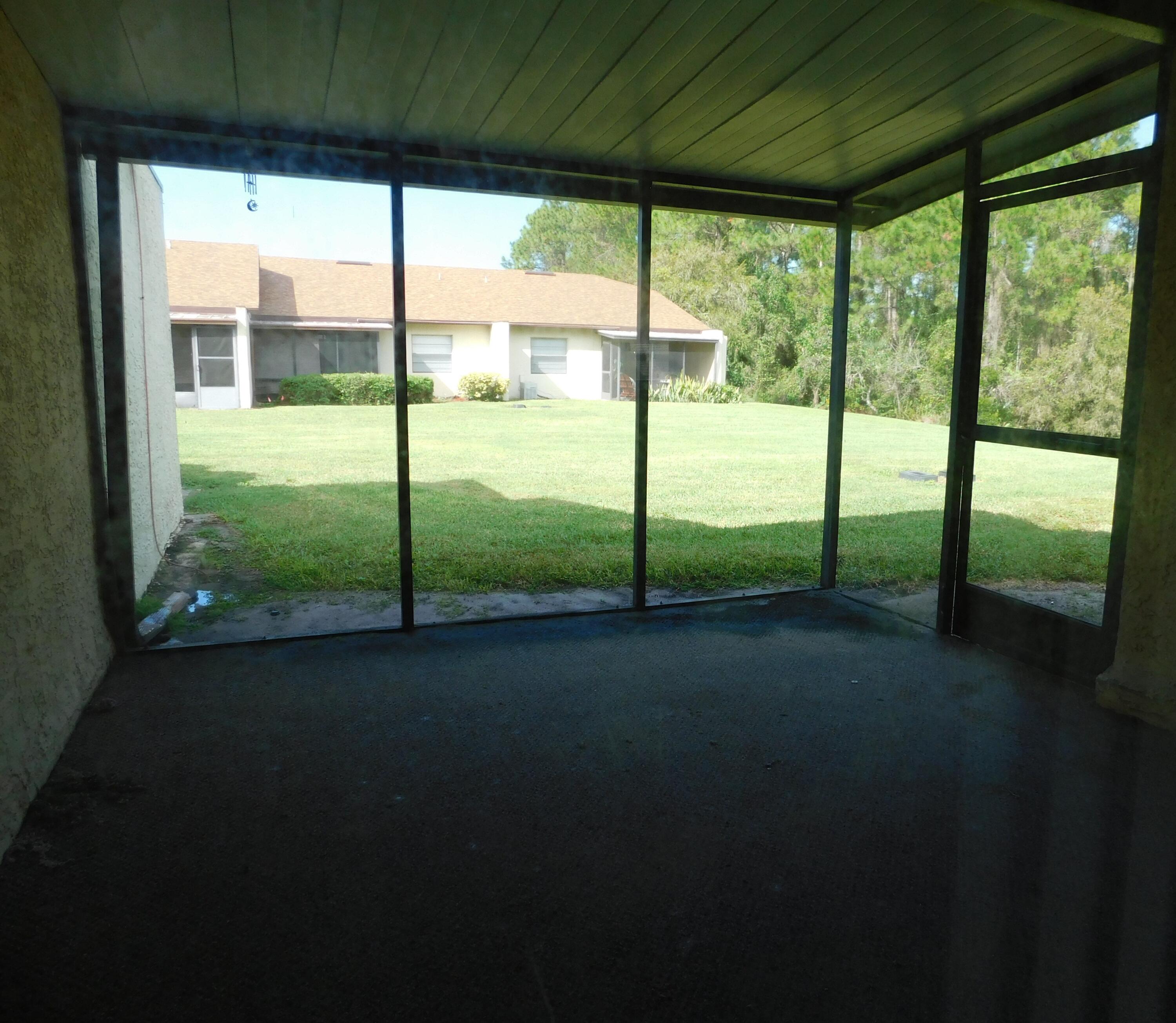 6036 Indrio Road, Unit 7 Fort Pierce, FL 34951 - Photo 9 of 16 Screened Porch