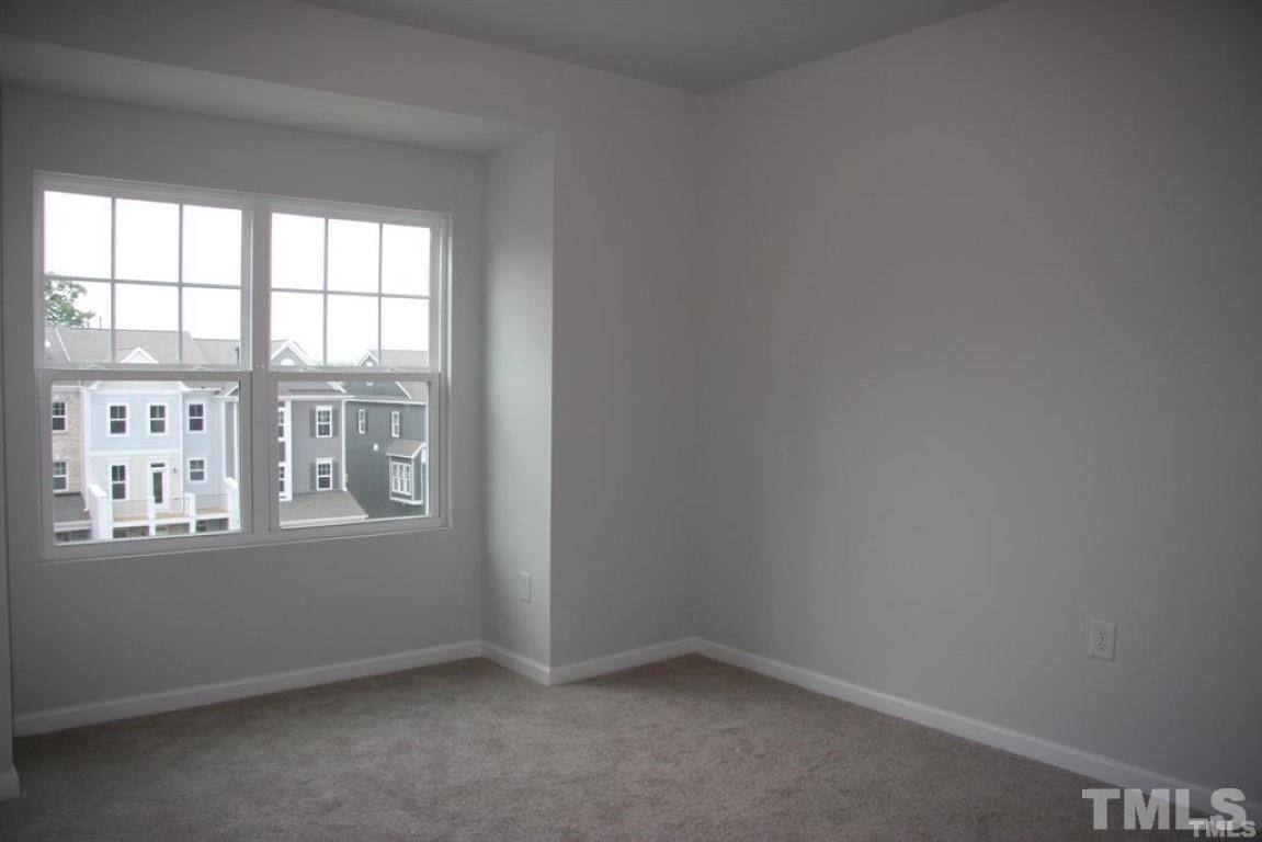 2919 Sunflower Road Apex, NC 27502 - Photo 24 of 34 an empty room with a window