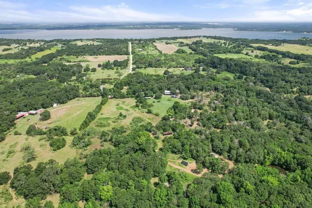 a view of a yard with an outdoor space