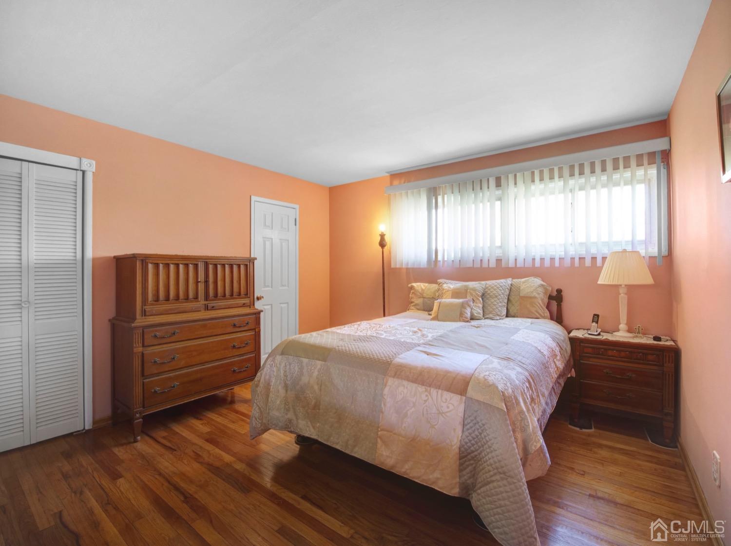 19 Purdue Road Old Bridge, NJ 08859 - Photo 17 of 21 a bedroom with a bed and wooden floor