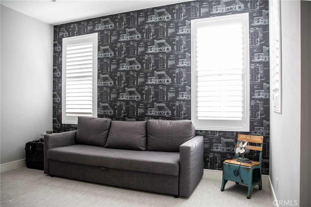 119 Wheatgrass Irvine, CA 92618 - Photo 20 of 32 a living room with furniture and a window