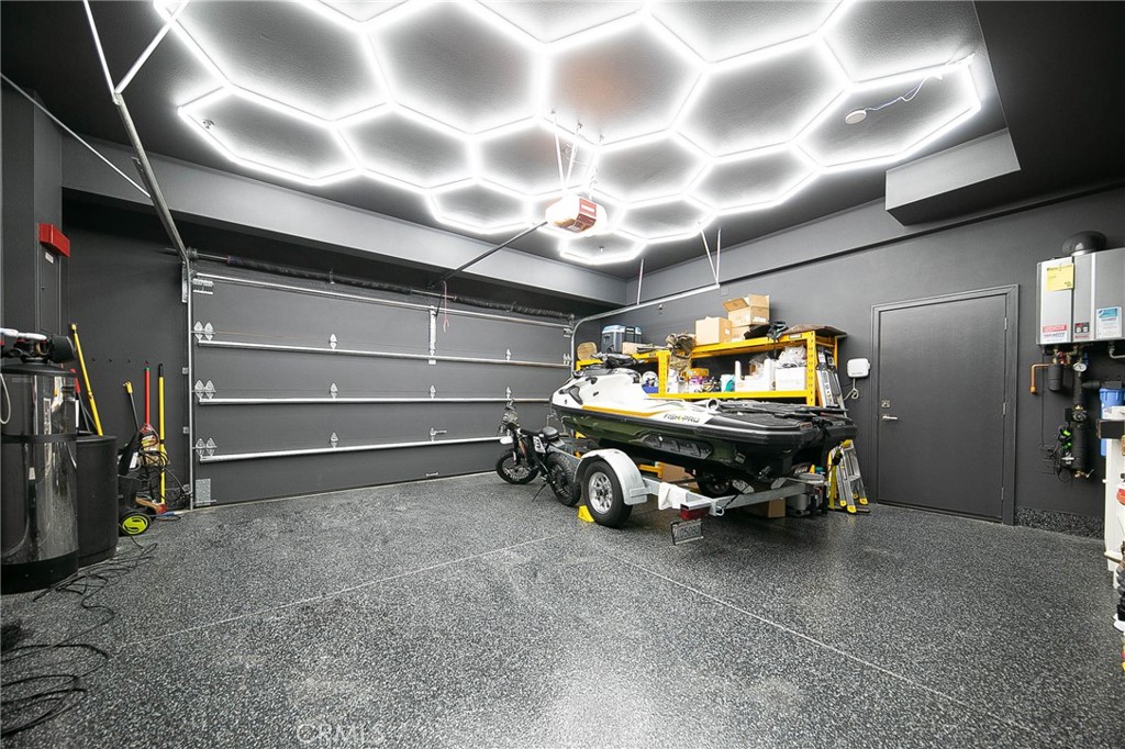 119 Wheatgrass Irvine, CA 92618 - Photo 31 of 32 a living room with furniture and a flat screen tv