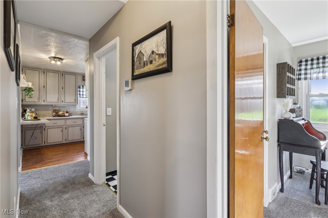 6623 Center Road Ashtabula, OH 44004 - Photo 10 of 49 Corridor featuring baseboards and carpet