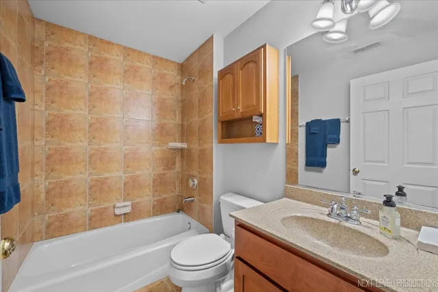 a view of a house with a yard and garage