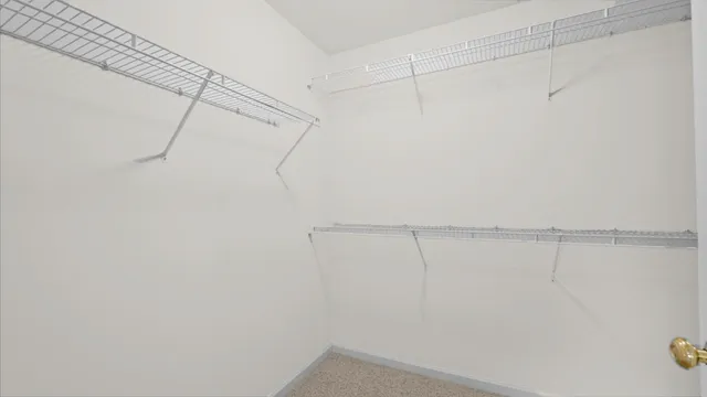 a view of a room with racks on the wall