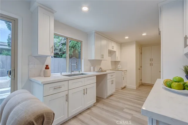 a bedroom with a bed and a lamp