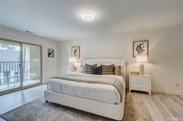 a view of a chairs and tables in the back yard of the house