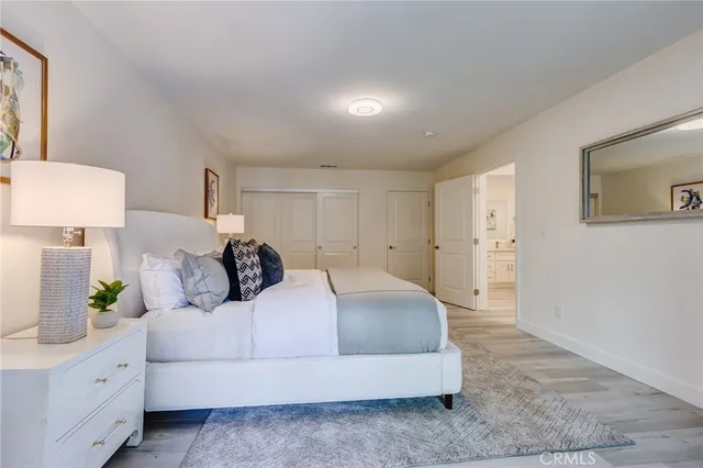 a balcony with table and chairs