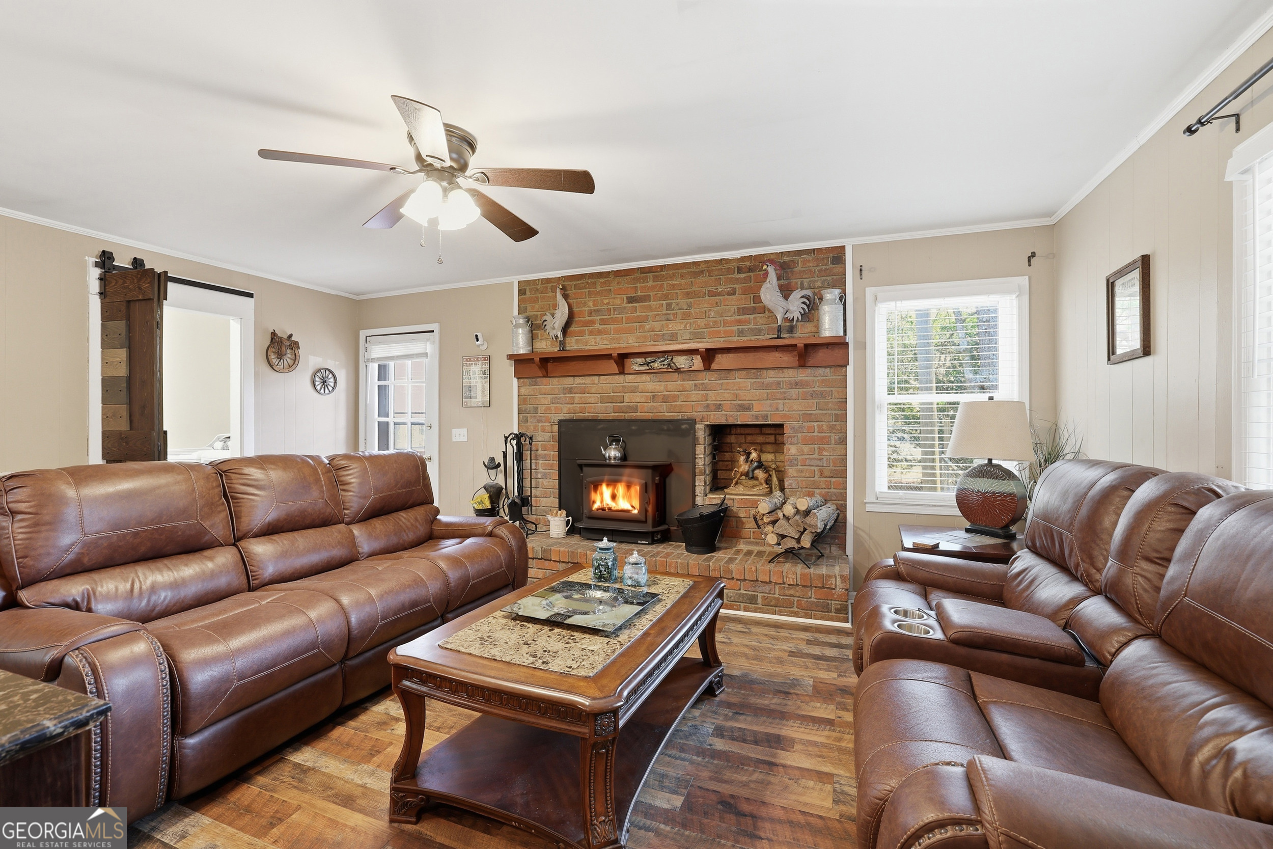 326 Remsdale Road Toccoa, GA 30577 - Photo 14 of 37 a living room with furniture and a fireplace
