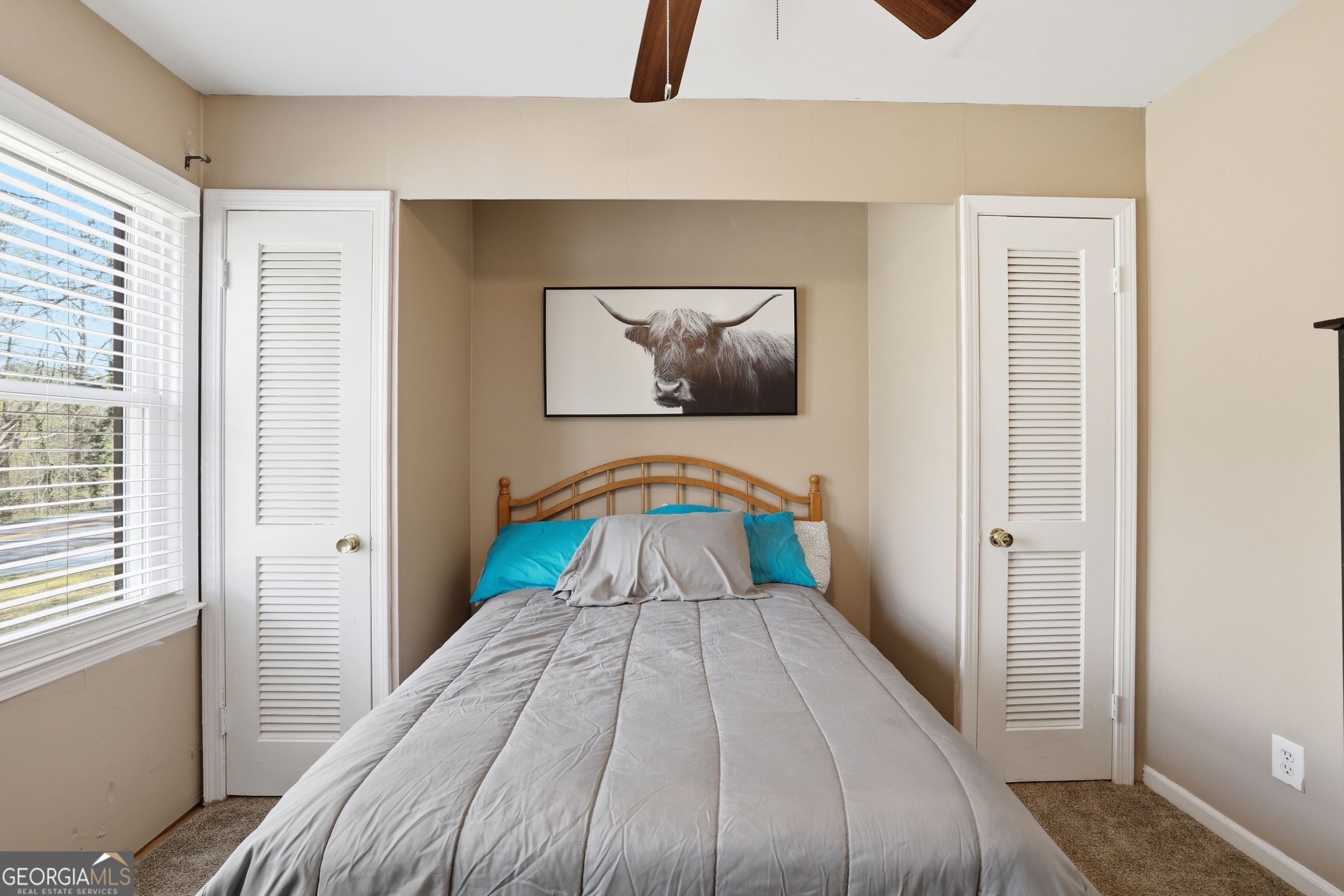 326 Remsdale Road Toccoa, GA 30577 - Photo 17 of 37 a view of a bedroom with wooden floor and bed