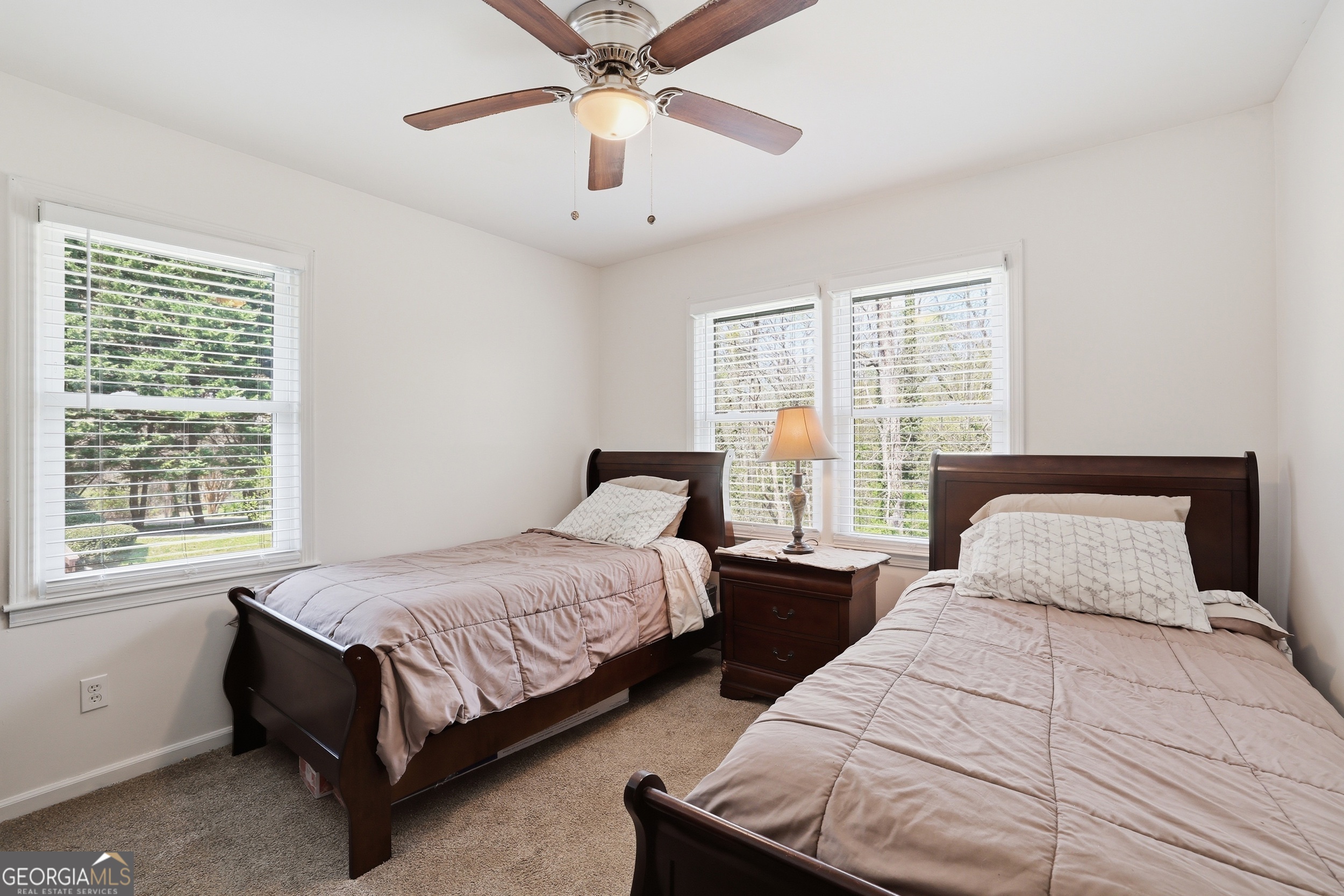 326 Remsdale Road Toccoa, GA 30577 - Photo 20 of 37 a bedroom with two beds and a large window