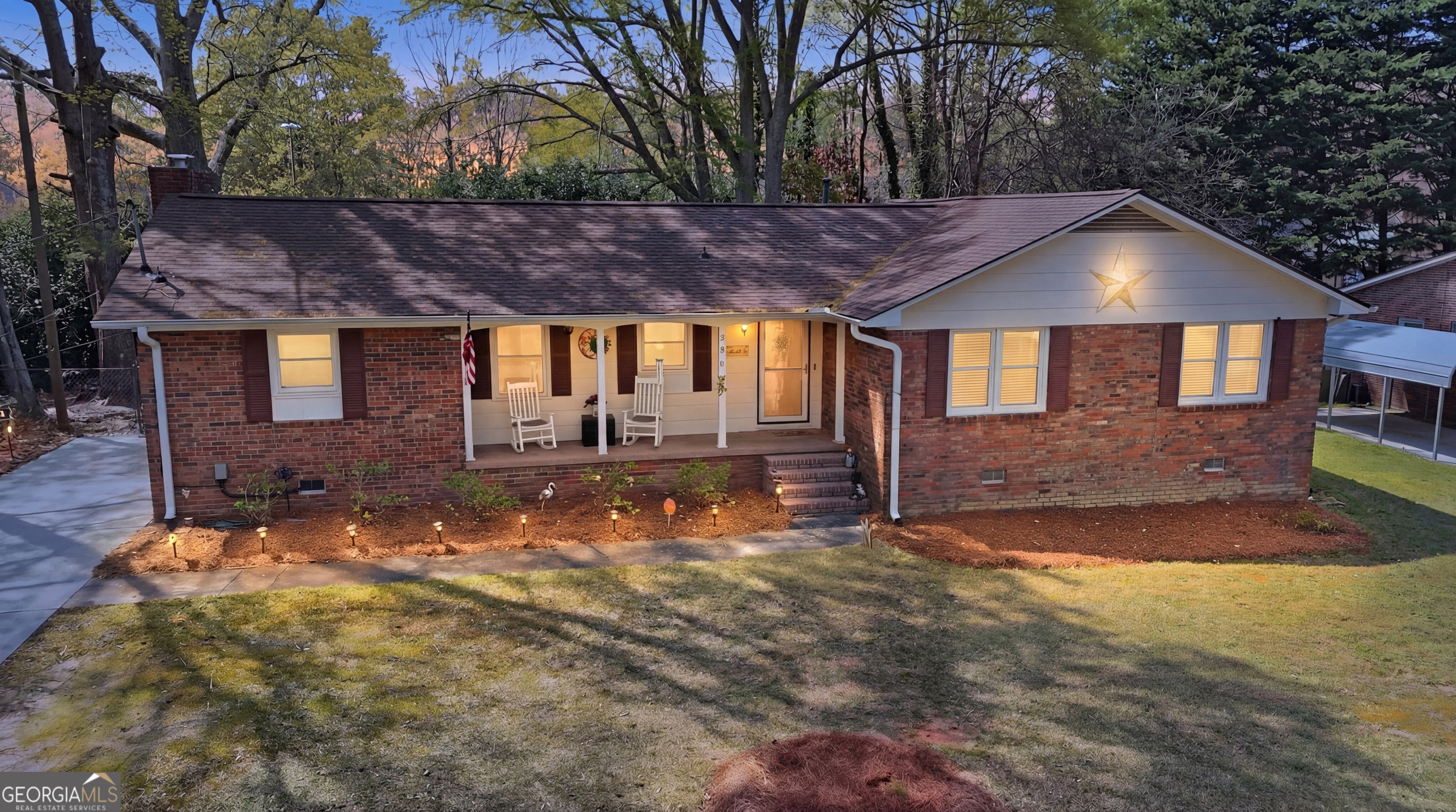 326 Remsdale Road Toccoa, GA 30577 - Photo 2 of 37 a house view with a garden space