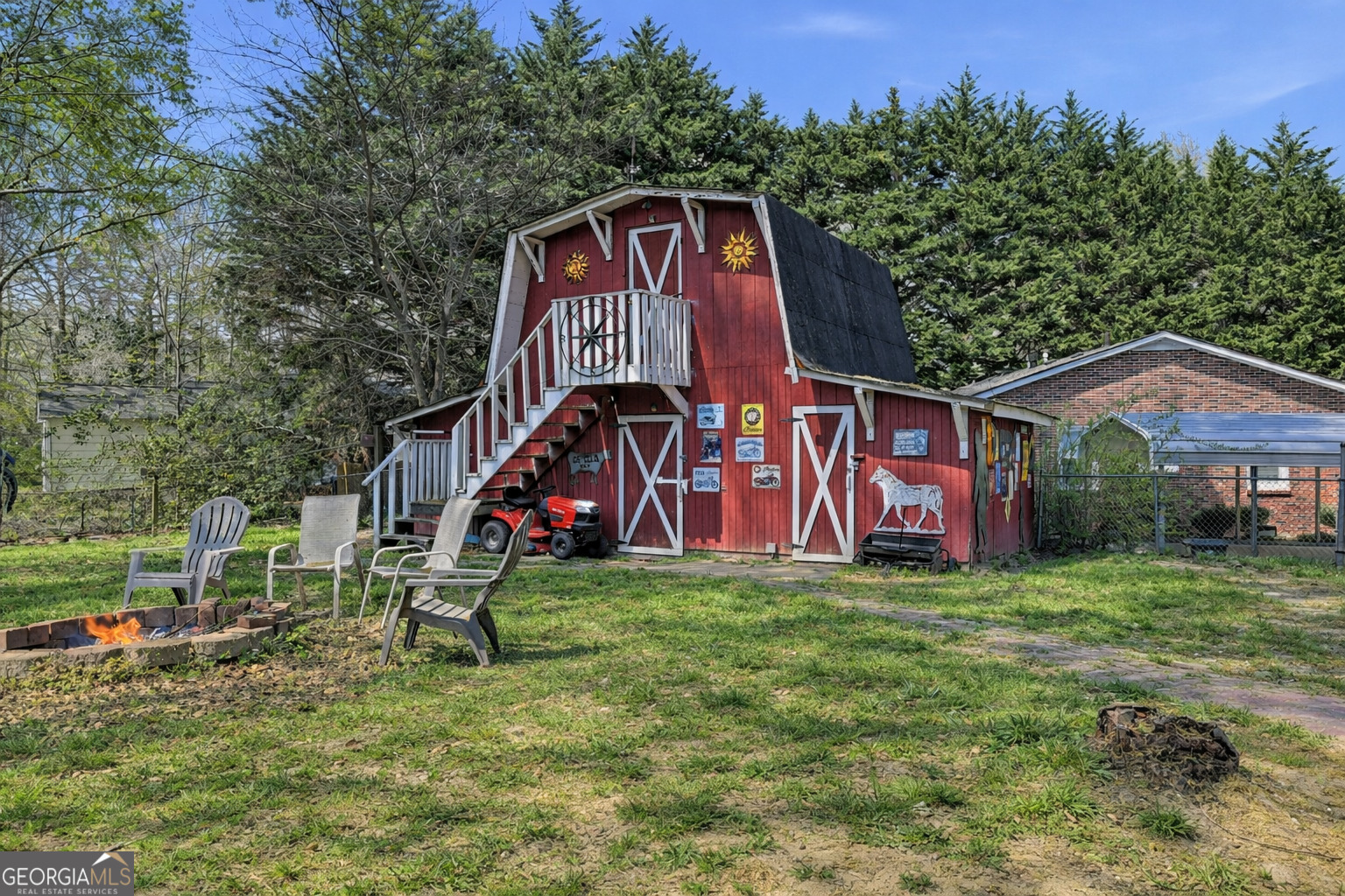 326 Remsdale Road Toccoa, GA 30577 - Photo 30 of 37 a view of a house with a yard
