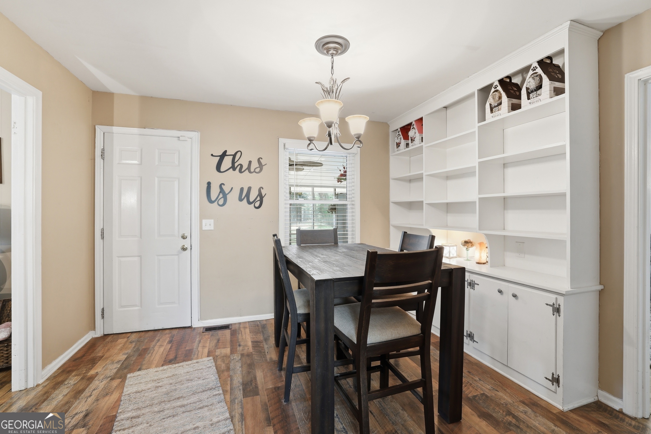 326 Remsdale Road Toccoa, GA 30577 - Photo 8 of 37 a view of a dining room with furniture window and wooden floor