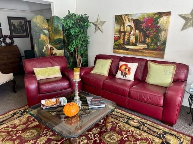 3143 Northeast 14th Street Ocala, FL 34470 - Photo 6 of 13 a living room with furniture and wooden floor
