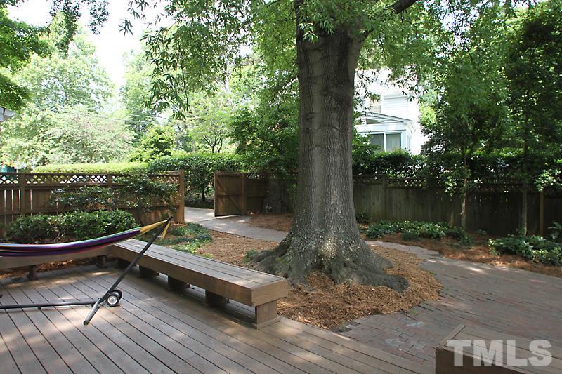2400 White Oak Road Raleigh, NC 27609 - Photo 19 of 20 a view of a wooden deck with a patio