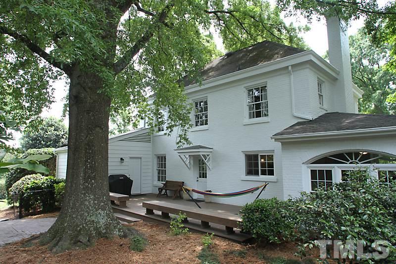 2400 White Oak Road Raleigh, NC 27609 - Photo 20 of 20 a white house that has a tree in front of it