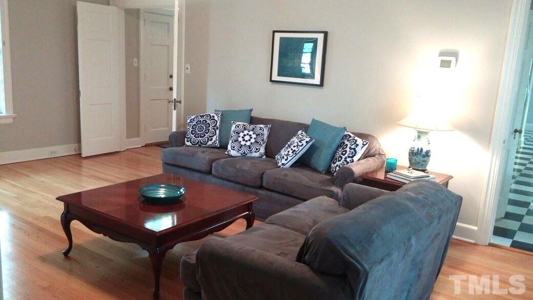 2400 White Oak Road Raleigh, NC 27609 - Photo 3 of 20 a living room with furniture and wooden floor