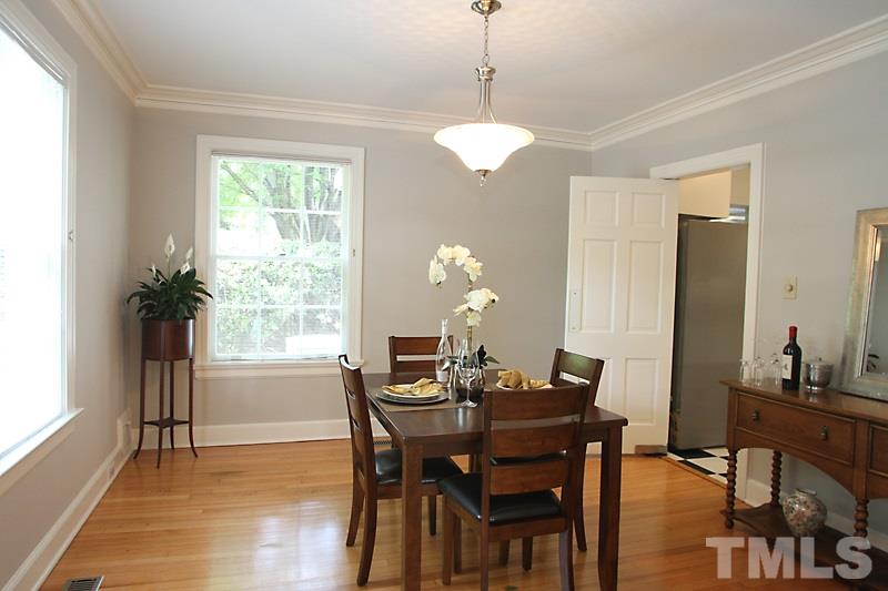 2400 White Oak Road Raleigh, NC 27609 - Photo 4 of 20 a view of a dining room with furniture window and outside view
