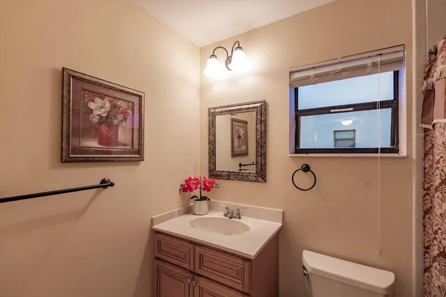 a view of a hallway with washer and dryer