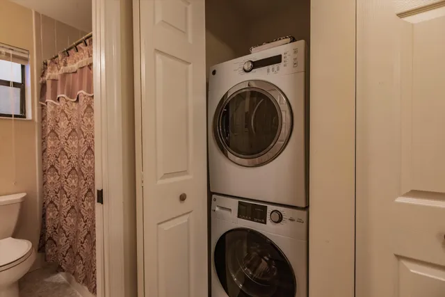 a view of a hallway with closet area