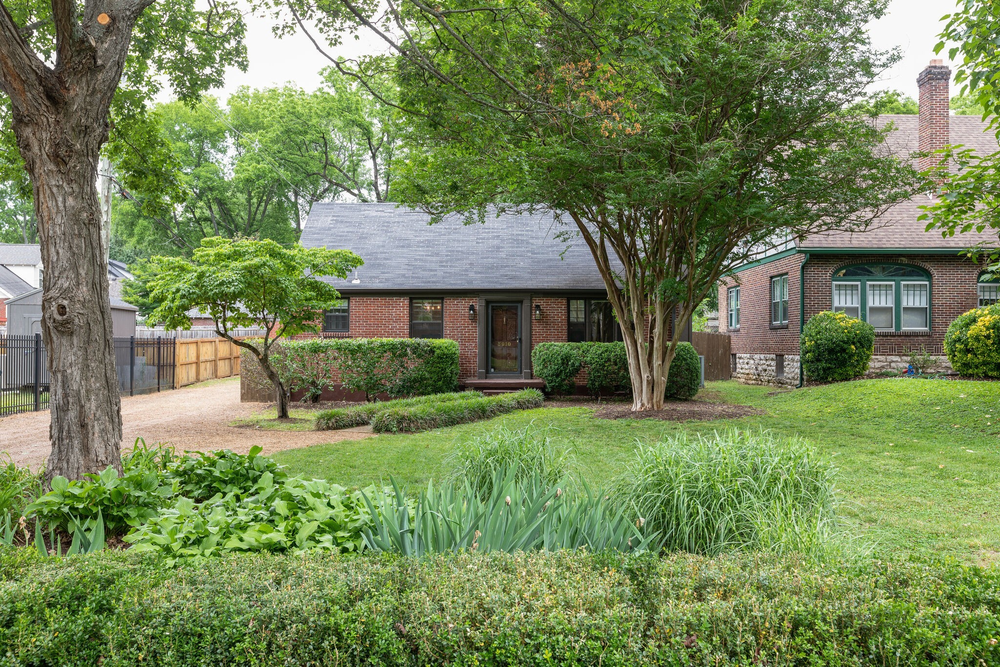3910 Valley Road Nashville, TN 37205 - Photo 1 of 41 a house view with a garden space
