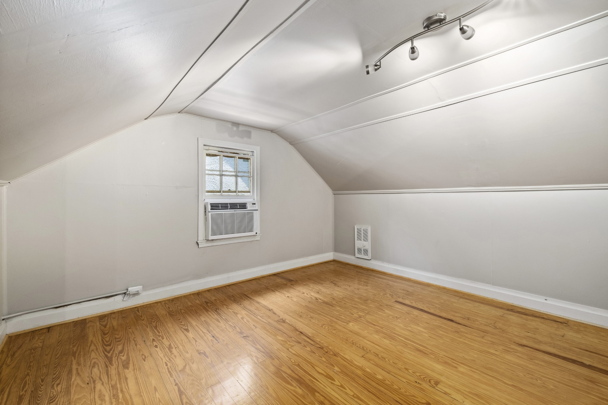 3910 Valley Road Nashville, TN 37205 - Photo 21 of 41 a view of a big room with wooden floor and windows