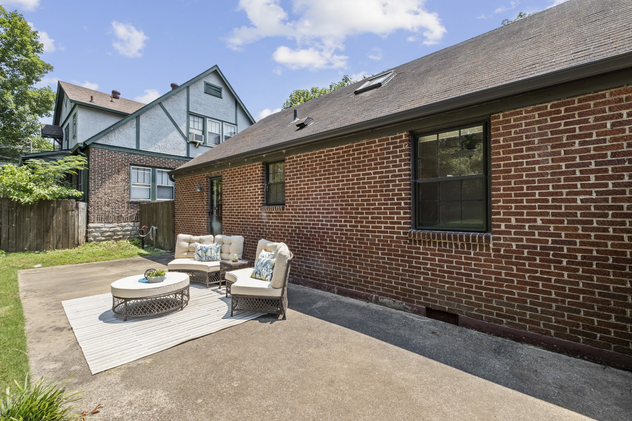 3910 Valley Road Nashville, TN 37205 - Photo 23 of 41 a view of a patio with a table and chairs and potted plants